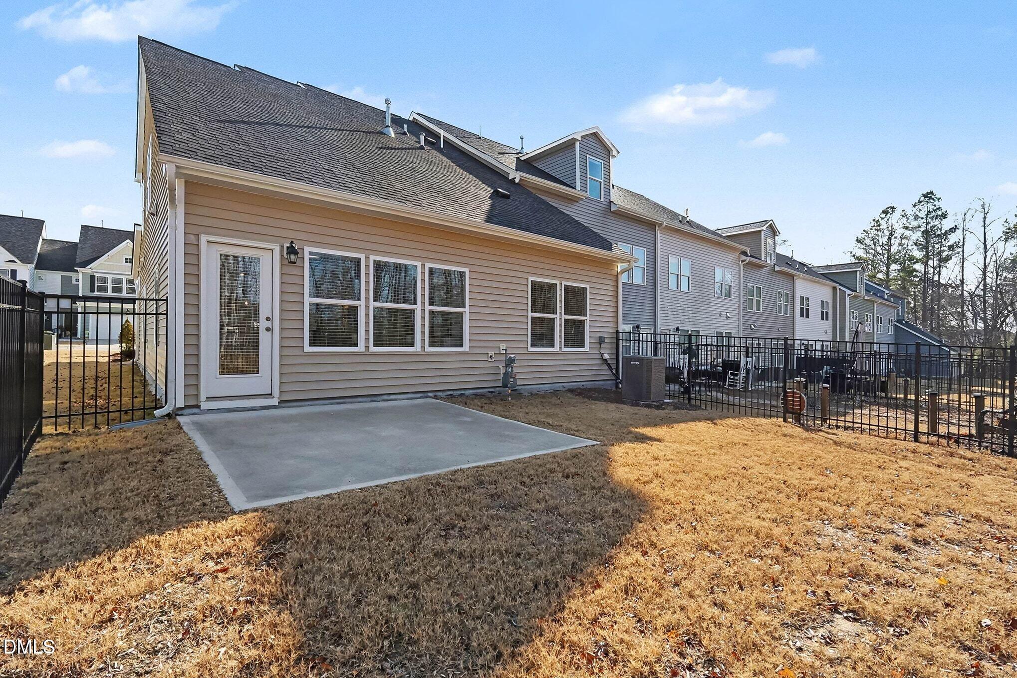 266 Shingle Oak Road Wake Forest, NC 27587 - Photo 23 of 36 a front view of a house with a yard and garage