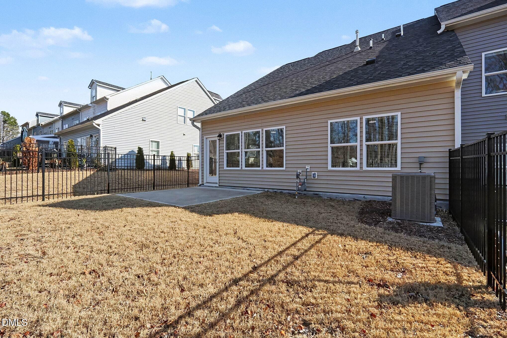 266 Shingle Oak Road Wake Forest, NC 27587 - Photo 24 of 36 a view of a house with a patio
