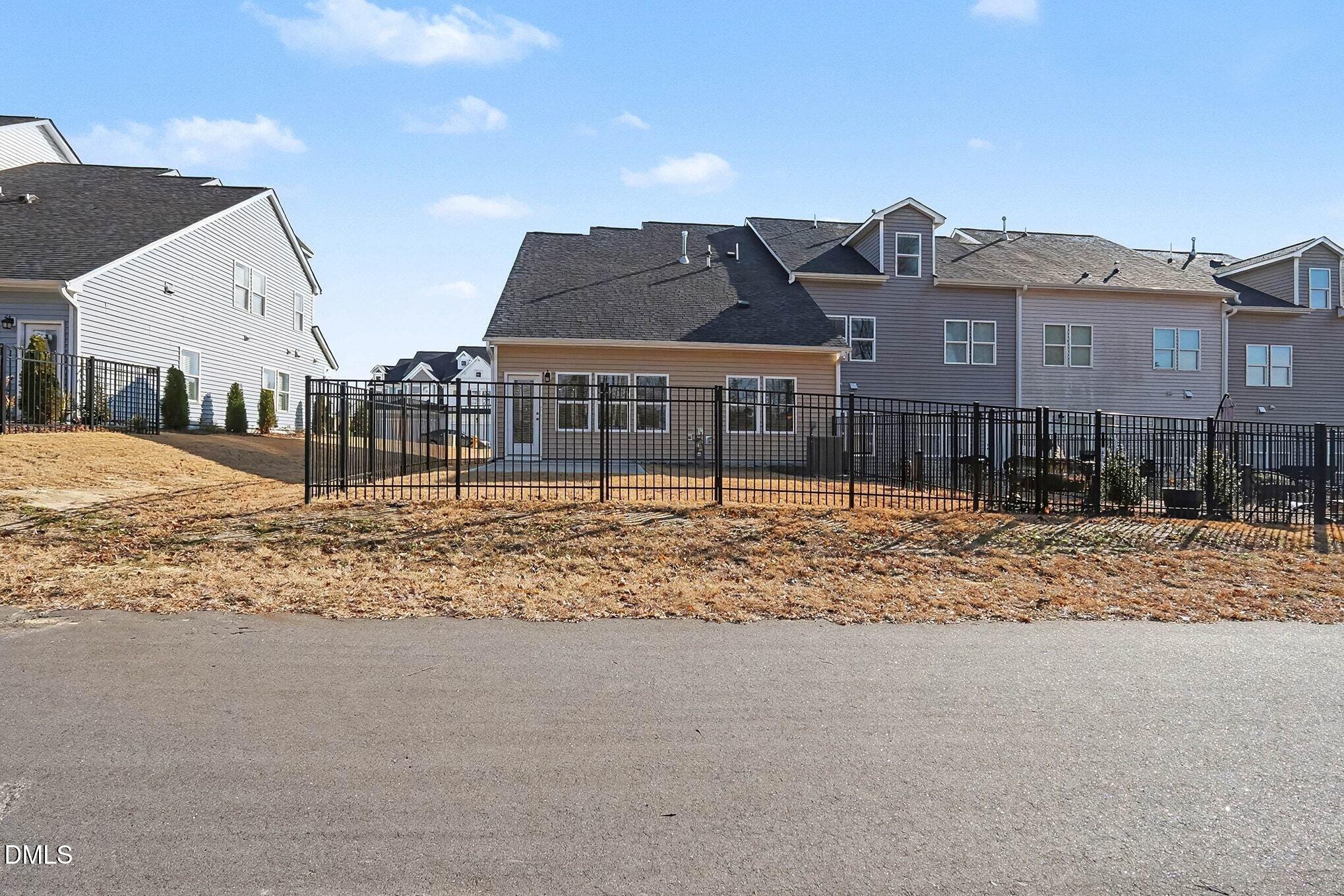 266 Shingle Oak Road Wake Forest, NC 27587 - Photo 25 of 36 a view of a large house with a yard