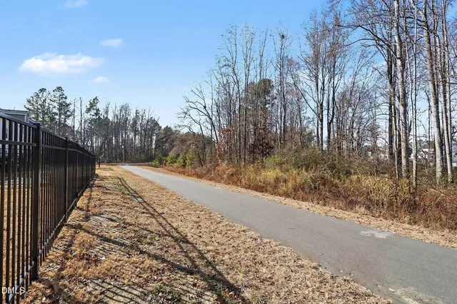 a view of a large house with a yard