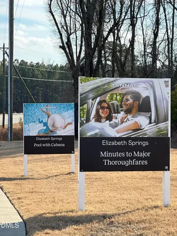 a sign broad on the side of the road