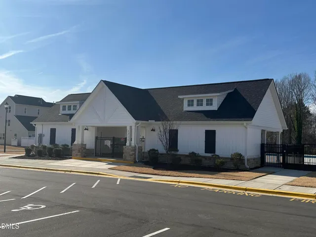a view of a chairs and table on the roof