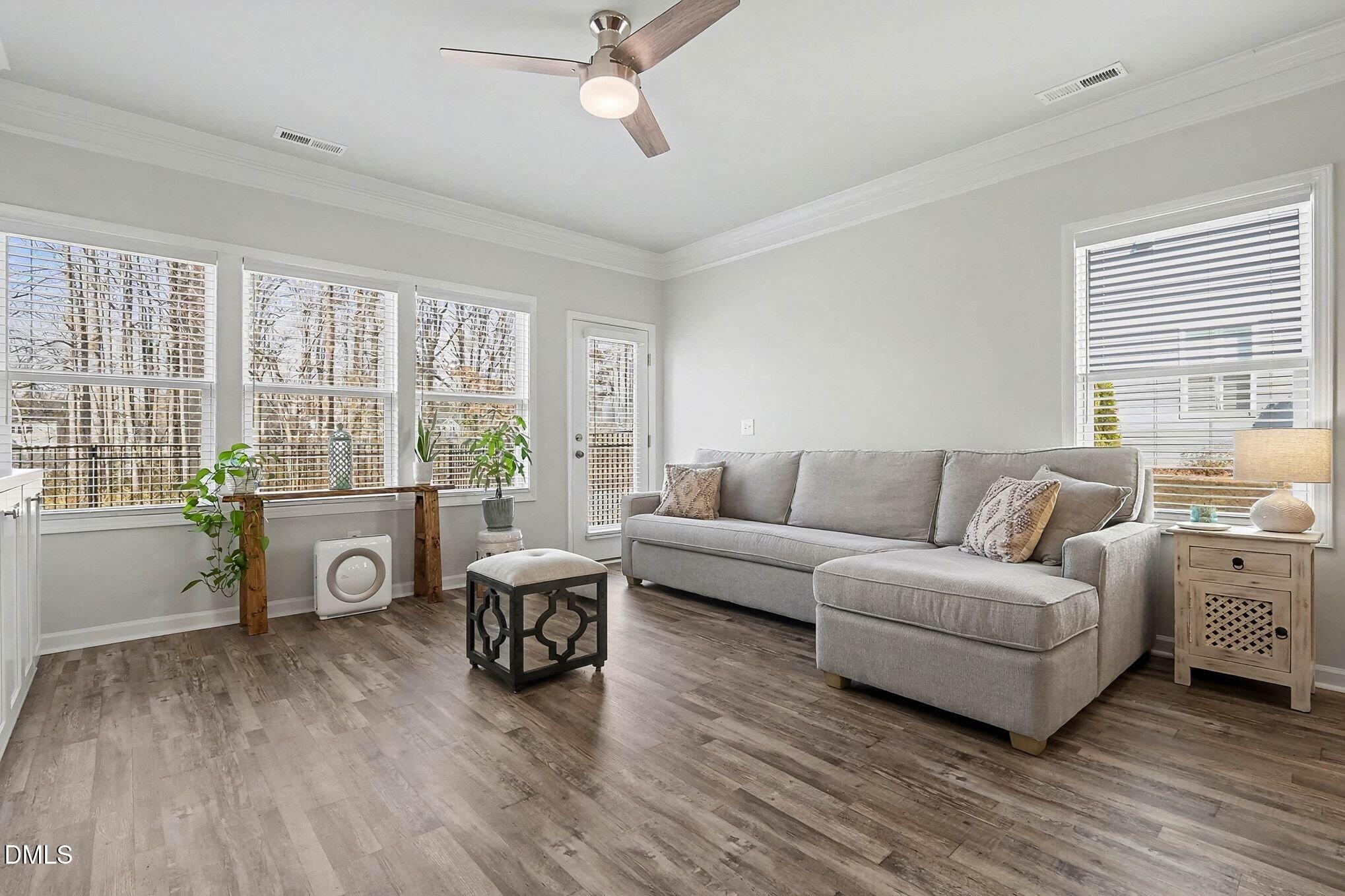 266 Shingle Oak Road Wake Forest, NC 27587 - Photo 5 of 36 a living room with furniture and a large window