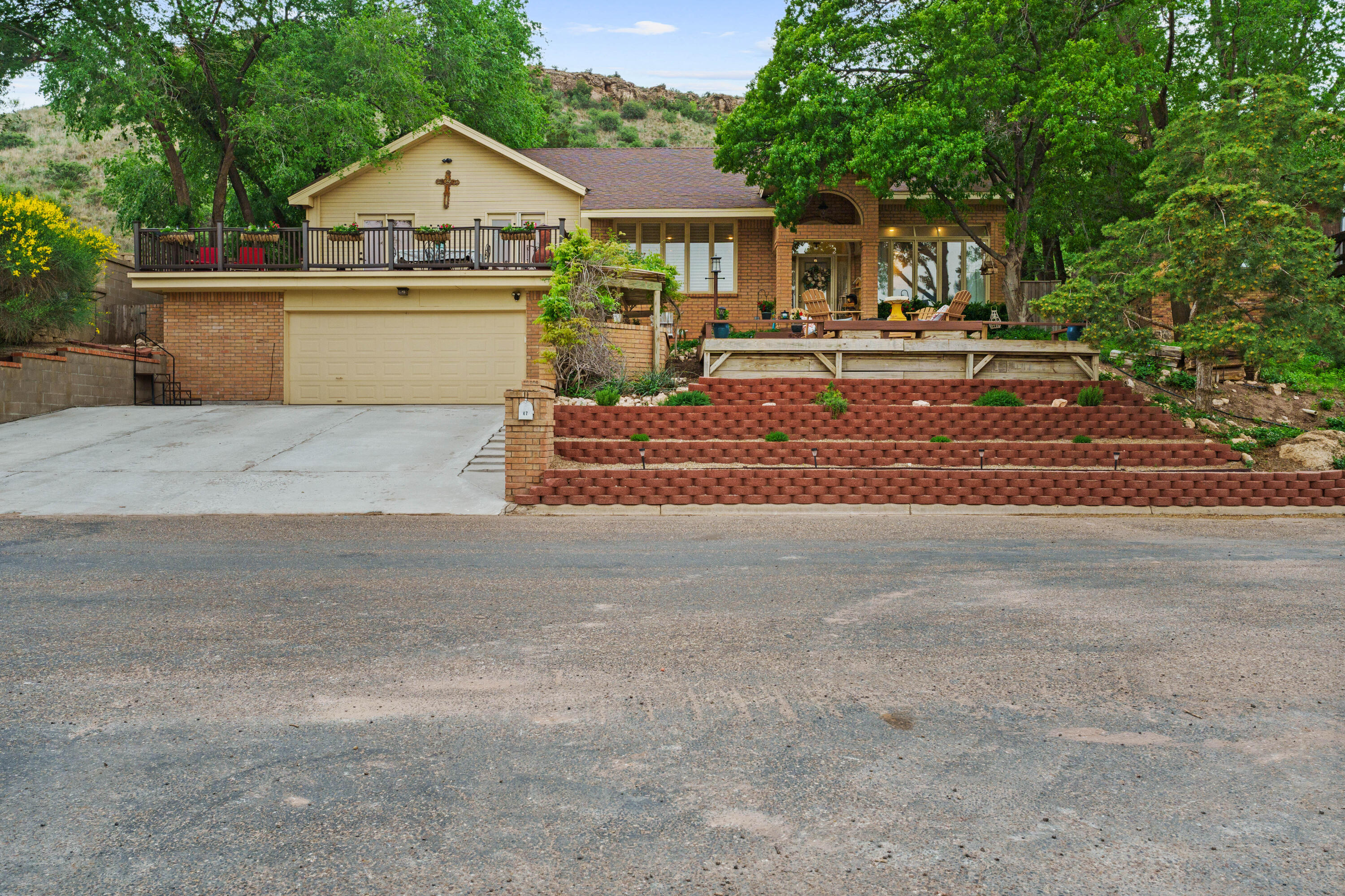 47 South Lake Shore Drive Ransom Canyon, TX 79366 - Photo 1 of 33 a front view of a house with a yard