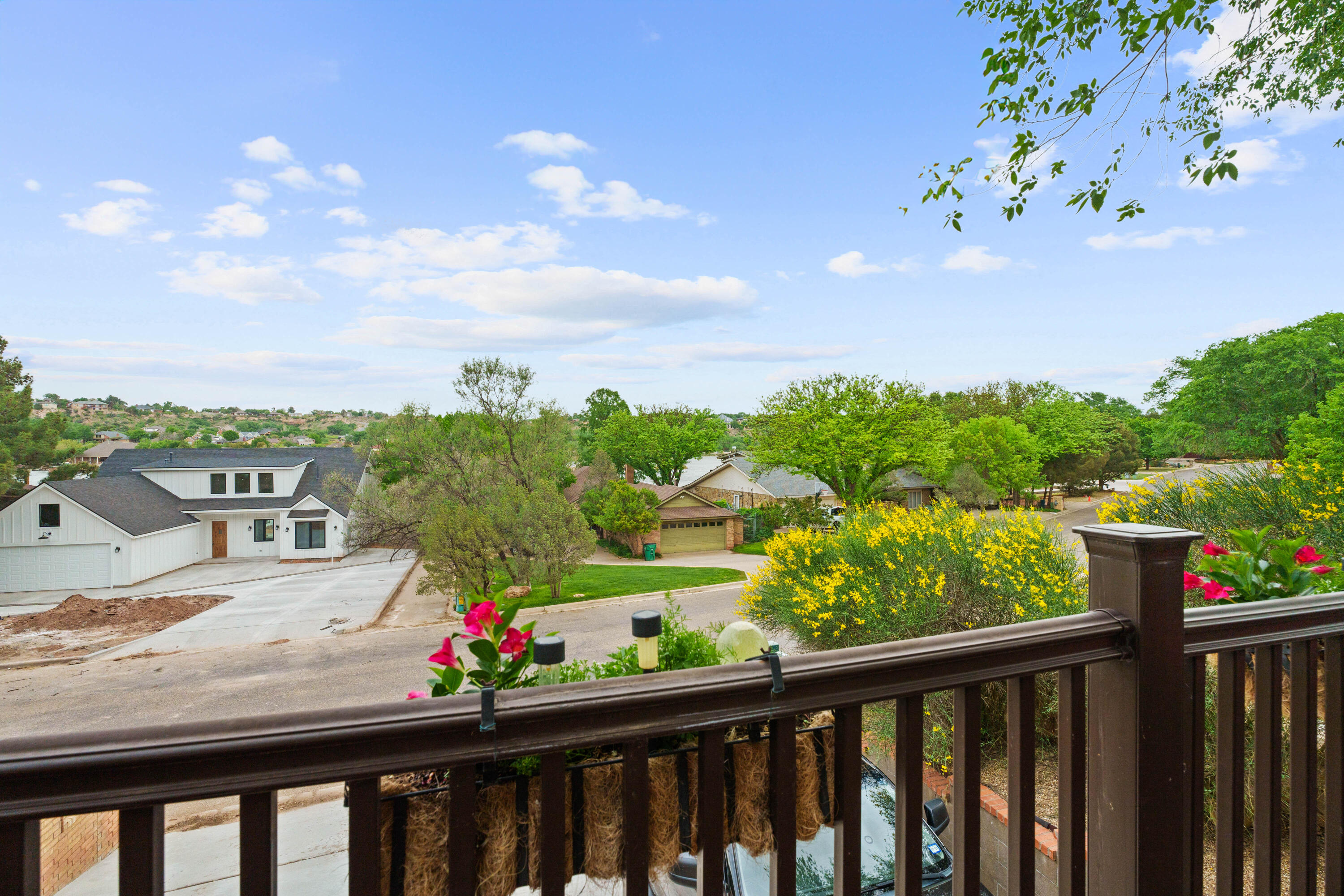 47 South Lake Shore Drive Ransom Canyon, TX 79366 - Photo 4 of 33 a view of a city from a balcony