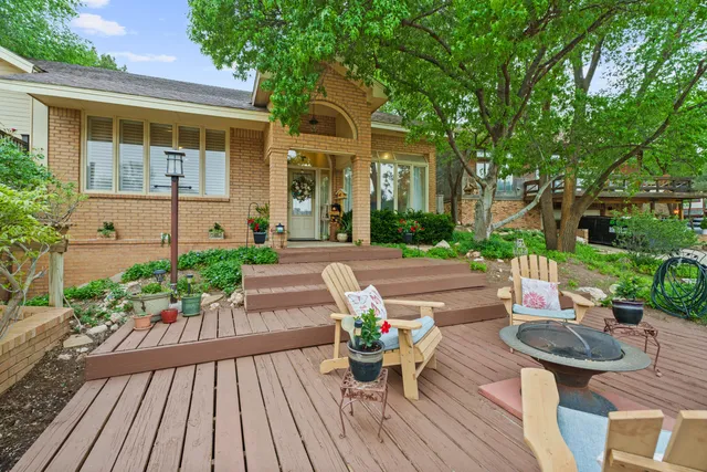 a view of a house with sitting area and furniture
