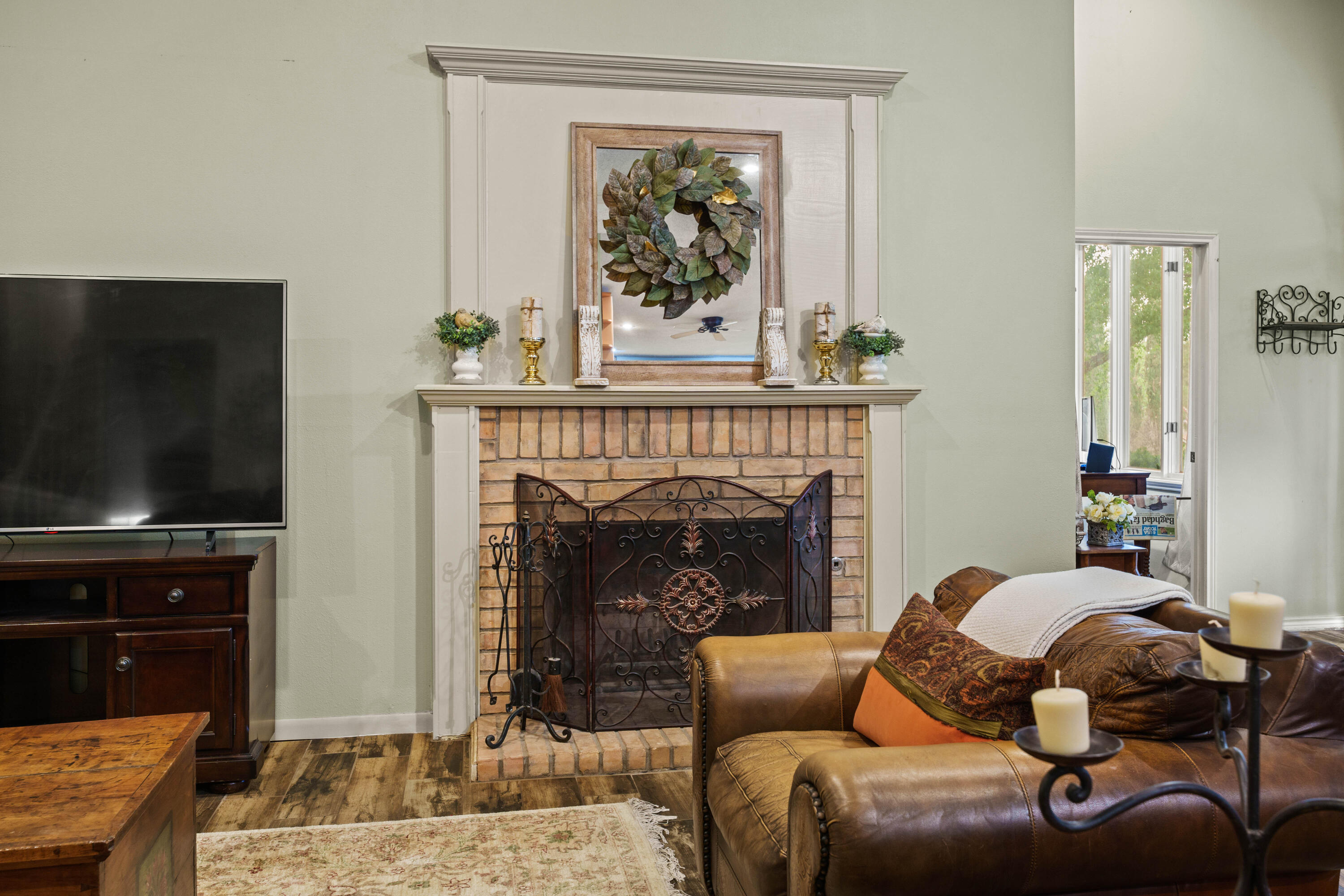 47 South Lake Shore Drive Ransom Canyon, TX 79366 - Photo 9 of 33 a living room with furniture and a fireplace