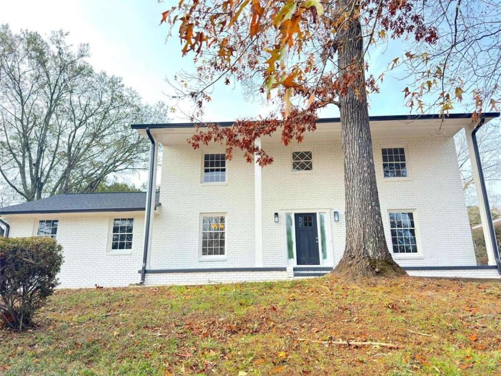 3827 Wake Forest Road Decatur, GA 30034 - Photo 1 of 1 front view of a house with a large tree