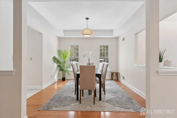 a view of a livingroom with furniture and windows