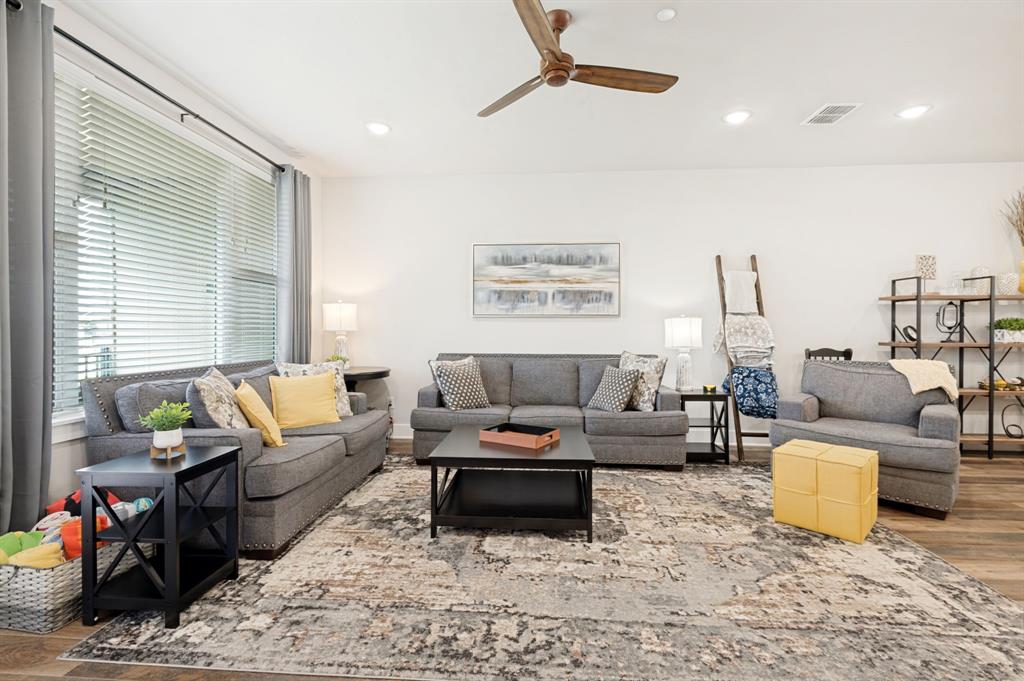 3412 Scenic Point Road, Unit 102 Graford, TX 76449 - Photo 11 of 31 a living room with furniture or couch and a window