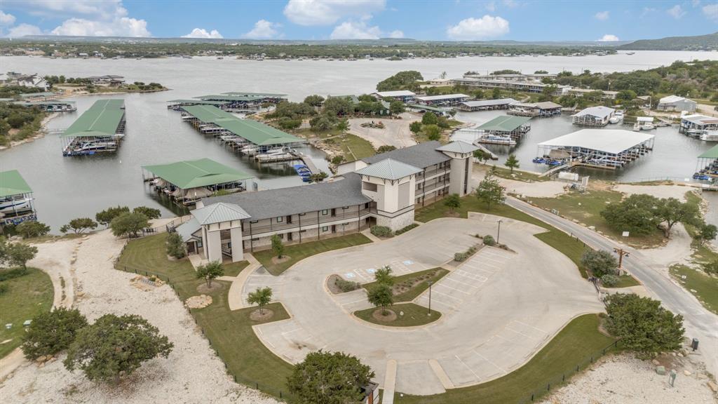 3412 Scenic Point Road, Unit 102 Graford, TX 76449 - Photo 29 of 31 an aerial view of residential houses with outdoor space