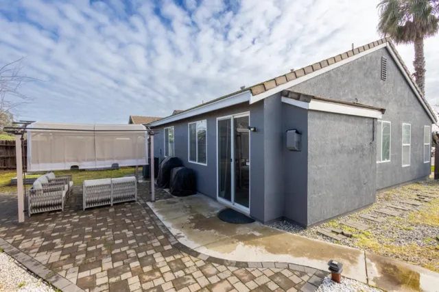 a outdoor space with lots of furniture and shower