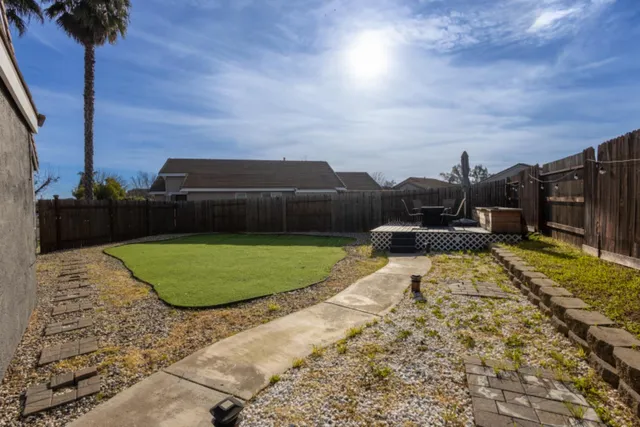 a view of a swimming pool with a garden
