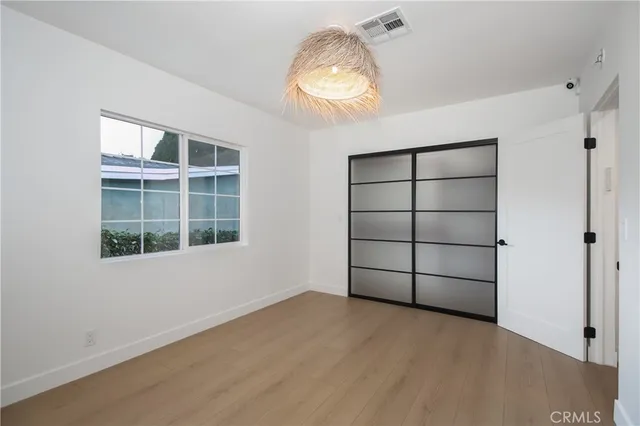 an empty room with a empty space and window