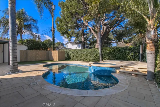 a house view with a swimming pool