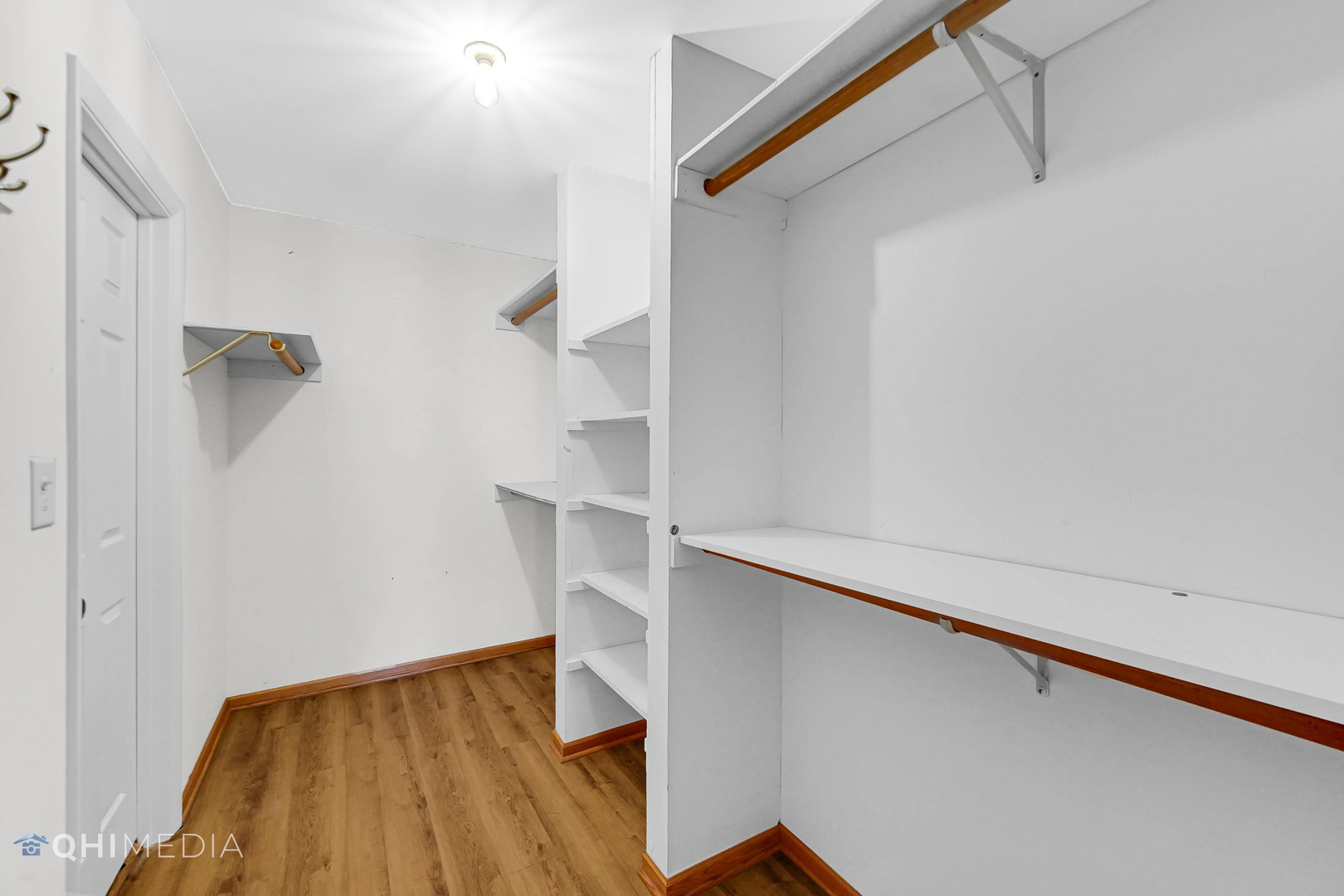 838 East Old Willow Road, Unit 103 Prospect Heights, IL 60070 - Photo 15 of 20 a view of walk in closet with empty racks