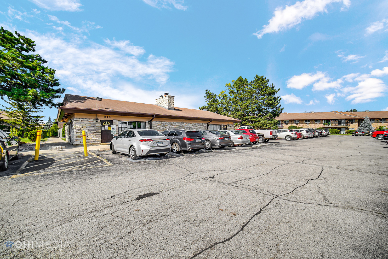 838 East Old Willow Road, Unit 103 Prospect Heights, IL 60070 - Photo 20 of 20 a car parked in front of a building