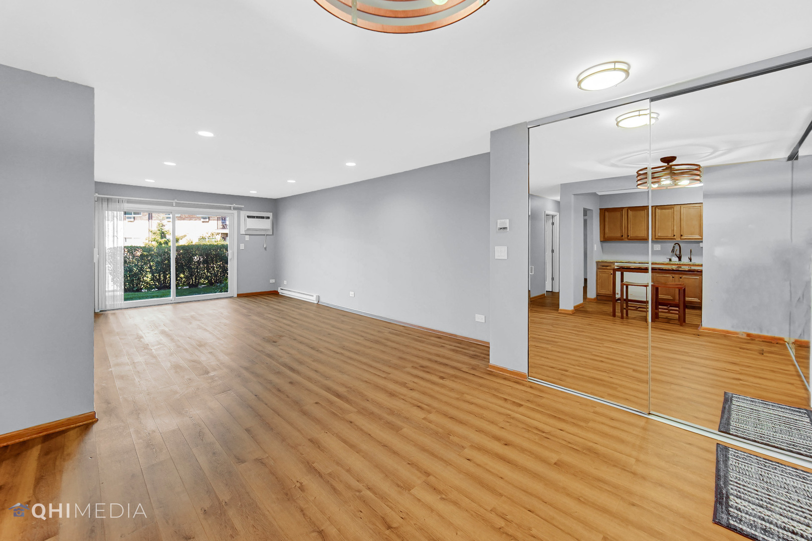 838 East Old Willow Road, Unit 103 Prospect Heights, IL 60070 - Photo 5 of 20 a view of empty room with wooden floor