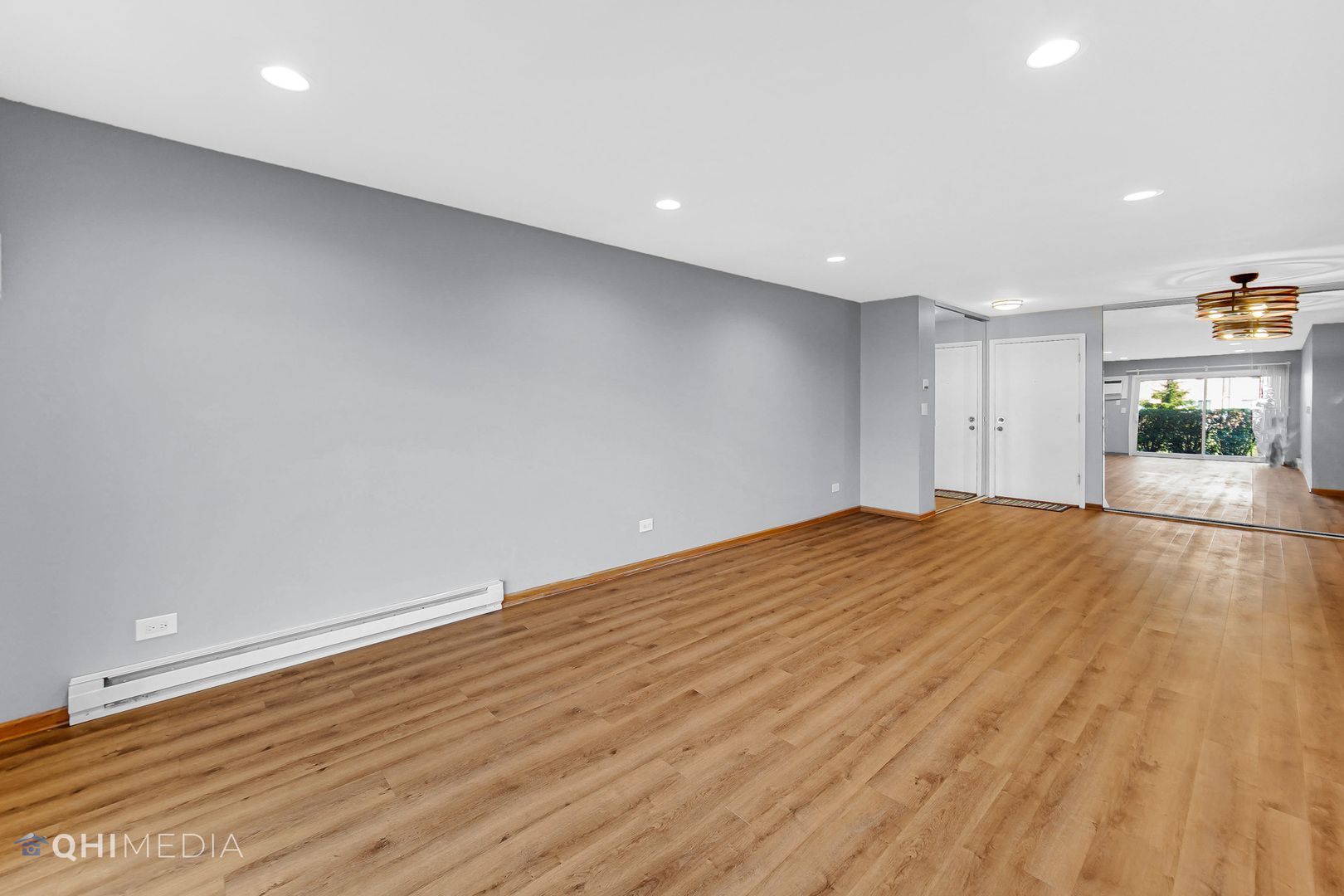 838 East Old Willow Road, Unit 103 Prospect Heights, IL 60070 - Photo 6 of 20 a view of empty room with wooden floor