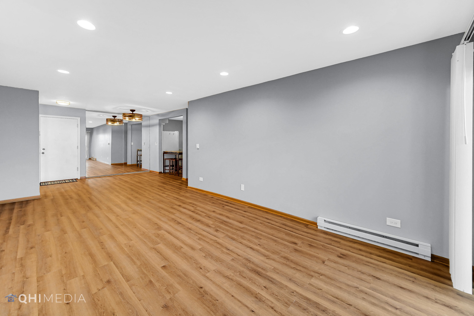 838 East Old Willow Road, Unit 103 Prospect Heights, IL 60070 - Photo 7 of 20 a view of empty room with wooden floor