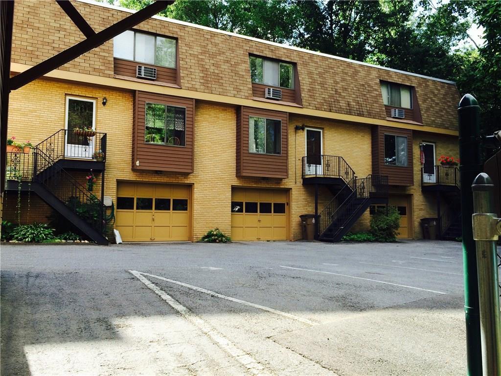 100 Maple Tree Avenue, Unit 4 Stamford, CT 06906 - Photo 1 of 1 a view of a house with street