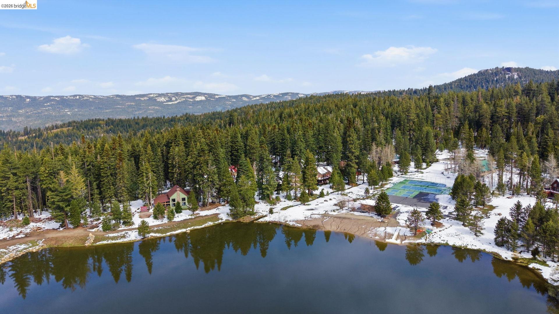 33840 Upper Leland Road, Unit 25A Pinecrest, CA 95364 - Photo 30 of 41 a view of a lake with a mountain