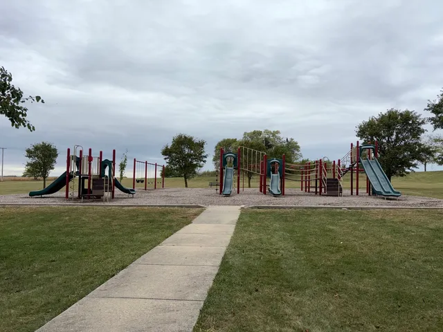 a view of outdoor space with garden and trees