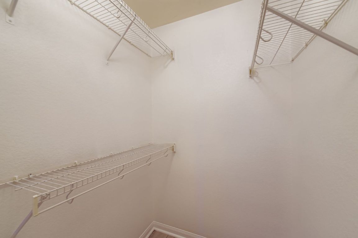 232 Millers Loop Jarrell, TX 76537 - Photo 19 of 34 a view of small space with racks on the wall