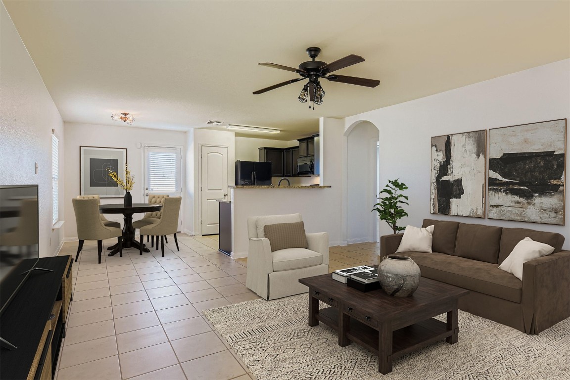 232 Millers Loop Jarrell, TX 76537 - Photo 5 of 34 a living room with furniture and a view of kitchen