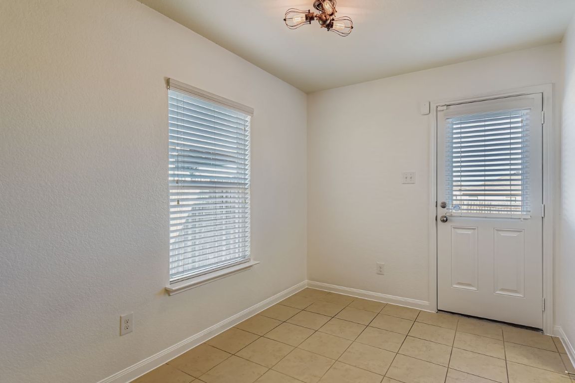 232 Millers Loop Jarrell, TX 76537 - Photo 10 of 34 a view of an empty room with a window