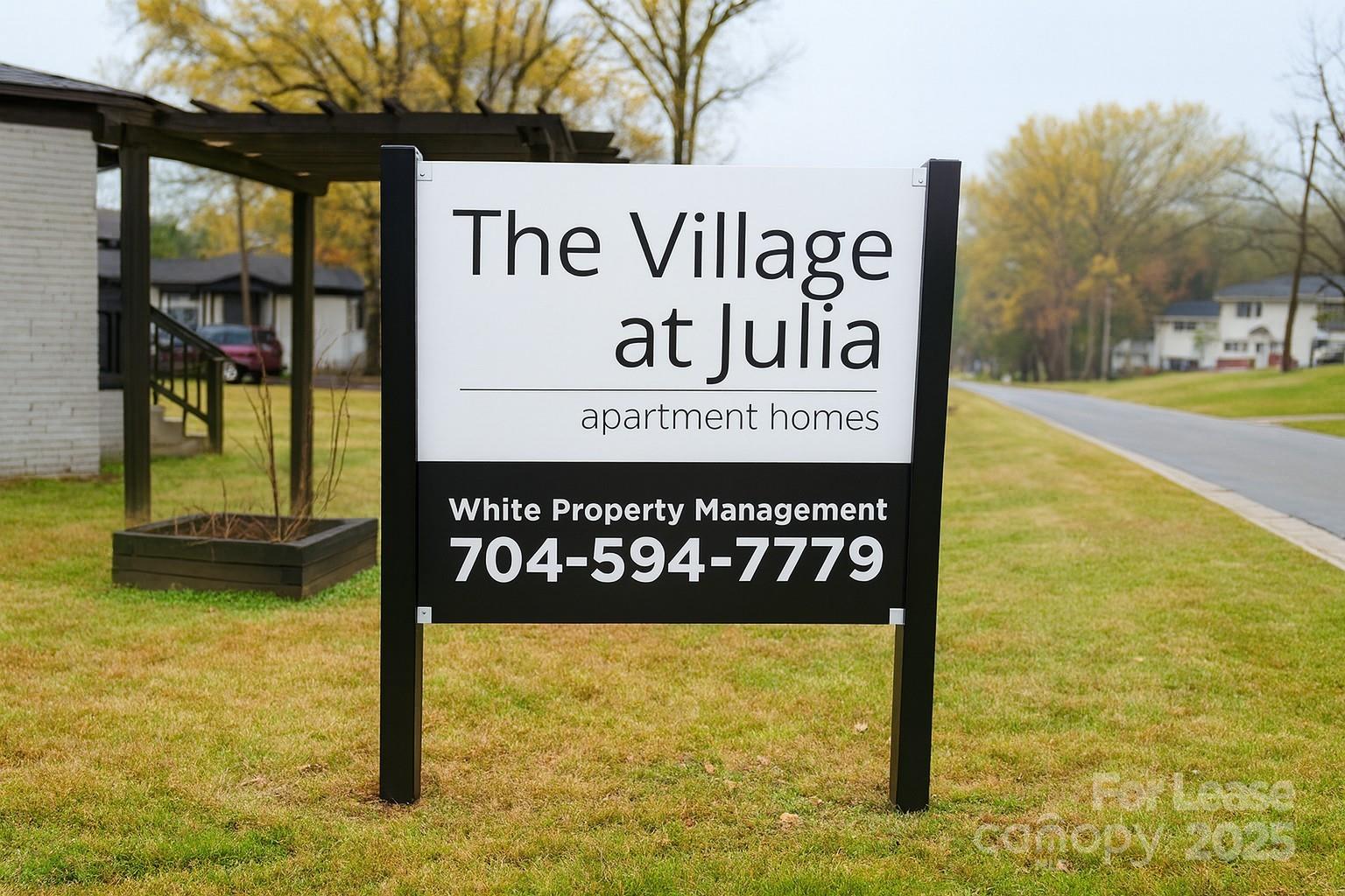 2407 Julia Avenue, Unit 3 Charlotte, NC 28206 - Photo 2 of 13 a sign board with ocean view