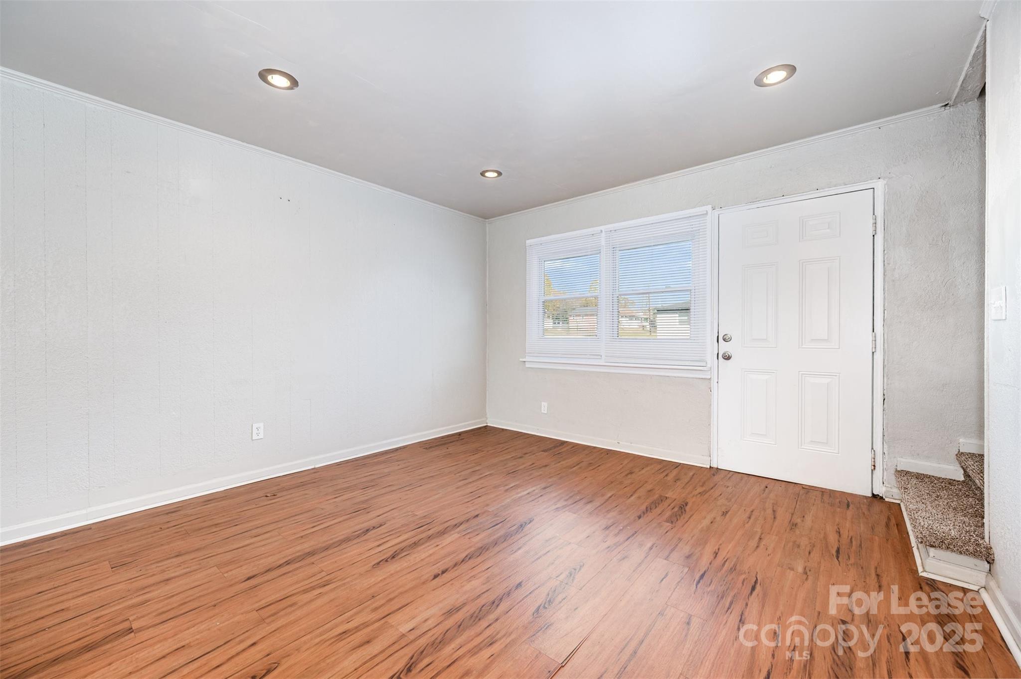 2407 Julia Avenue, Unit 3 Charlotte, NC 28206 - Photo 4 of 13 wooden floor in an empty room