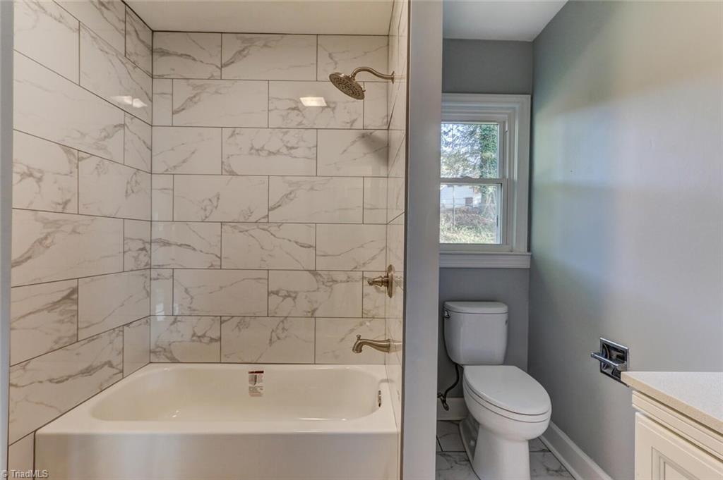 1211 Robin Road Eden, NC 27288 - Photo 8 of 21 Tile shower, all new fixtures, tub, toilet, flooring, vanity