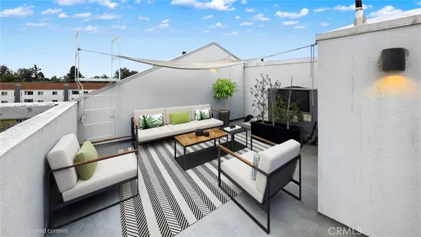 a outdoor living space with furniture