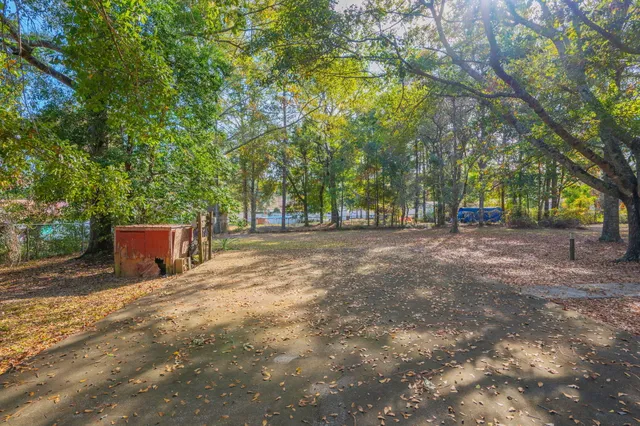 a view of backyard with outdoor space