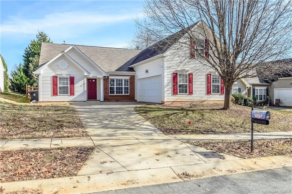 13422 Latta Gordon Road Huntersville, NC 28078 - Photo 1 of 24 a front view of a house with a yard