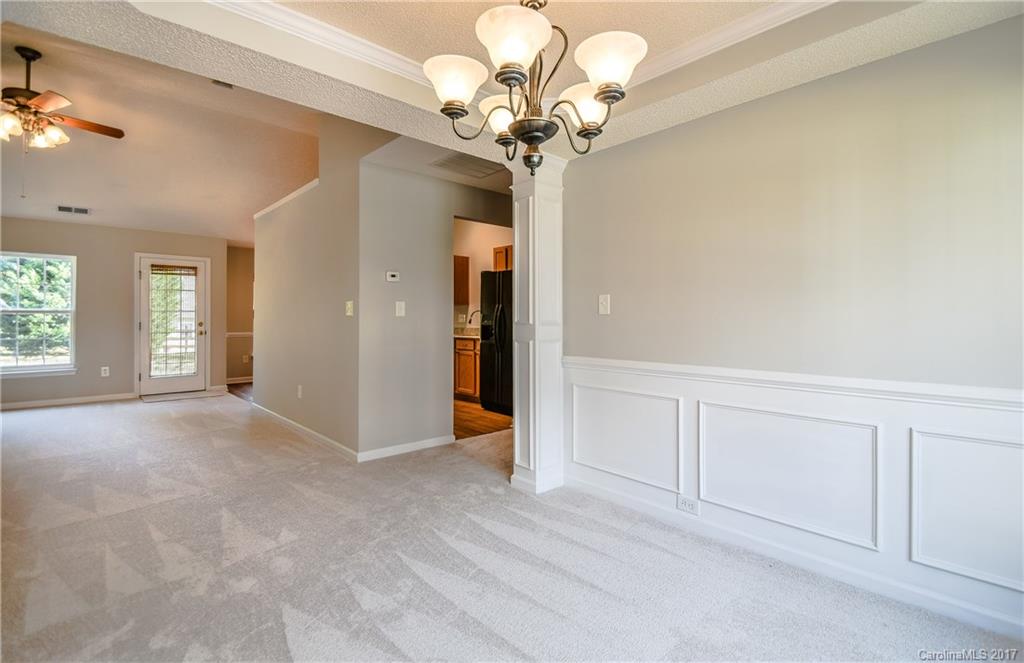 13422 Latta Gordon Road Huntersville, NC 28078 - Photo 3 of 24 a view of a livingroom with a chandelier fan