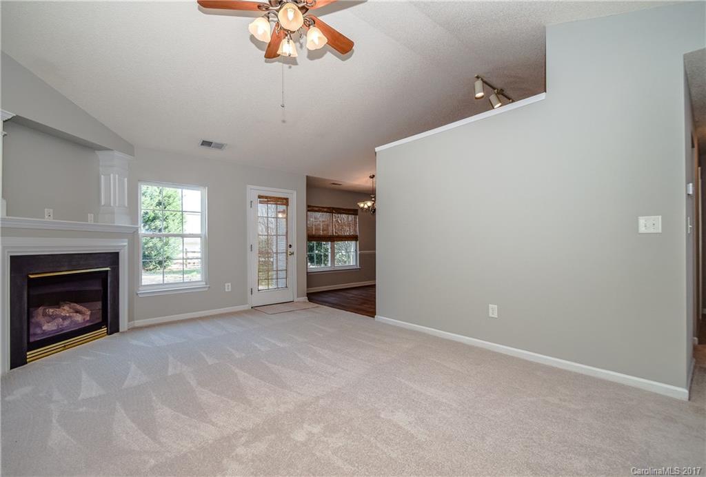 13422 Latta Gordon Road Huntersville, NC 28078 - Photo 7 of 24 a view of a livingroom with a fireplace