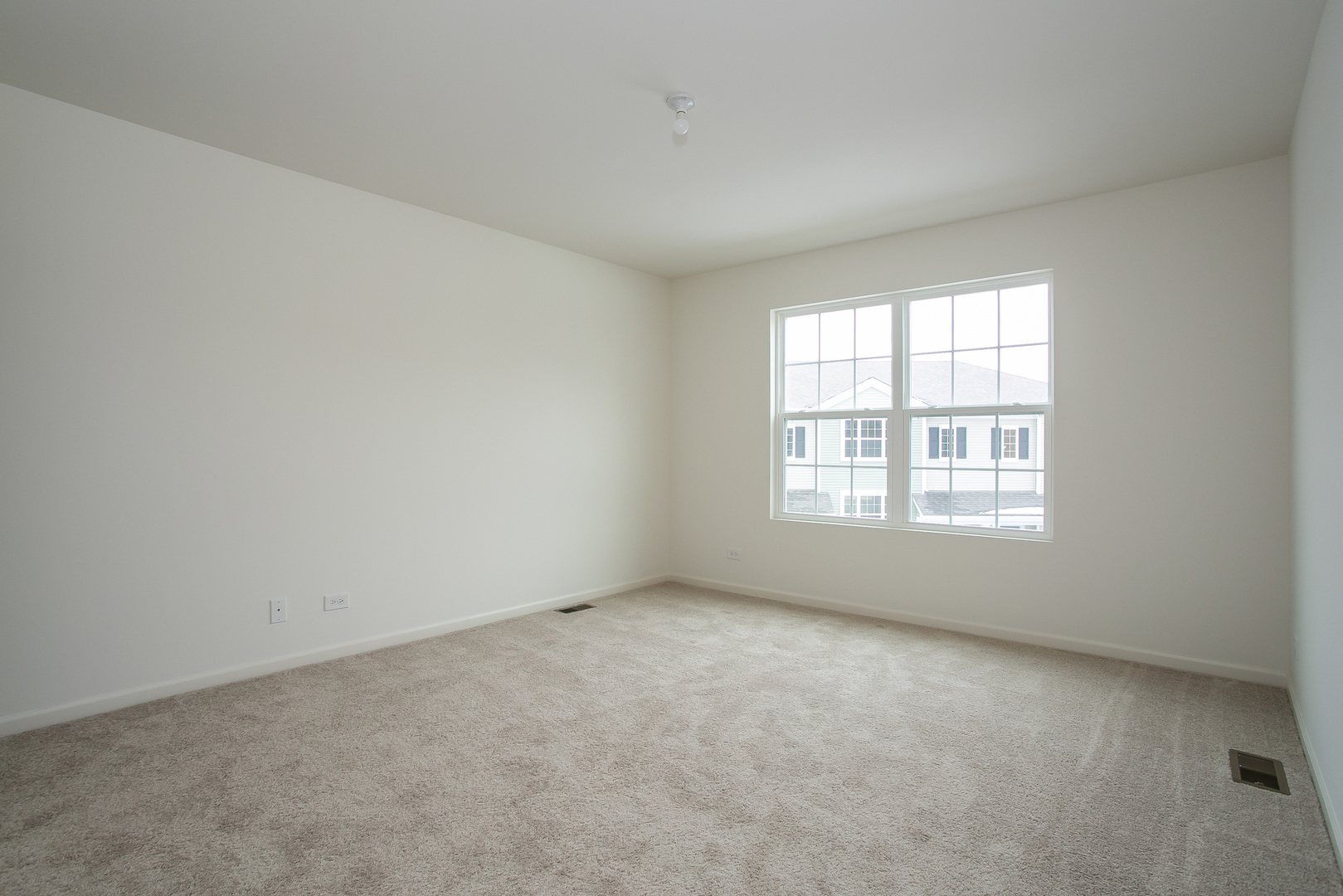 2369 Upland Road Pingree Grove, IL 60140 - Photo 7 of 18 an empty room with a window