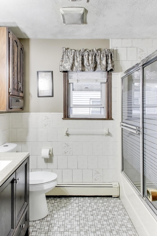 3 River St Court Lynn, MA 01905 - Photo 16 of 24 a bathroom with a sink a toilet and mirror