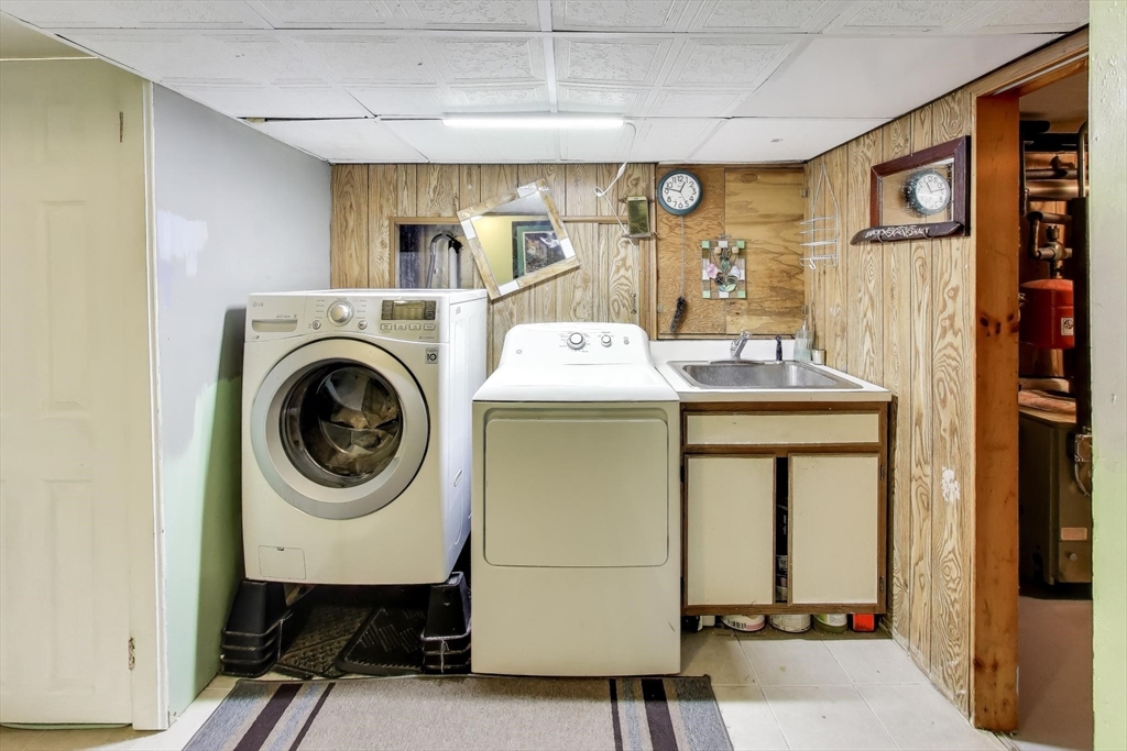 3 River St Court Lynn, MA 01905 - Photo 19 of 24 a utility room with dryer and washer
