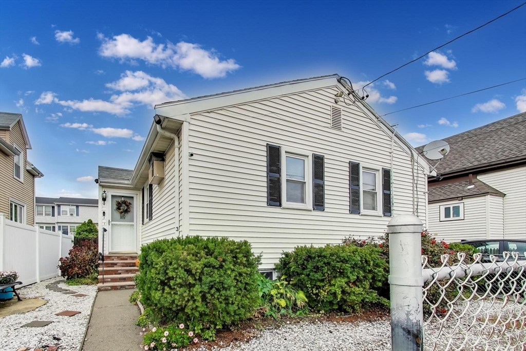 3 River St Court Lynn, MA 01905 - Photo 2 of 24 a view of a house with a yard