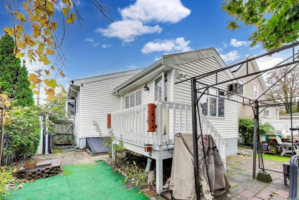 3 River St Court Lynn, MA 01905 - Photo 22 of 24 a view of a house with backyard and sitting area