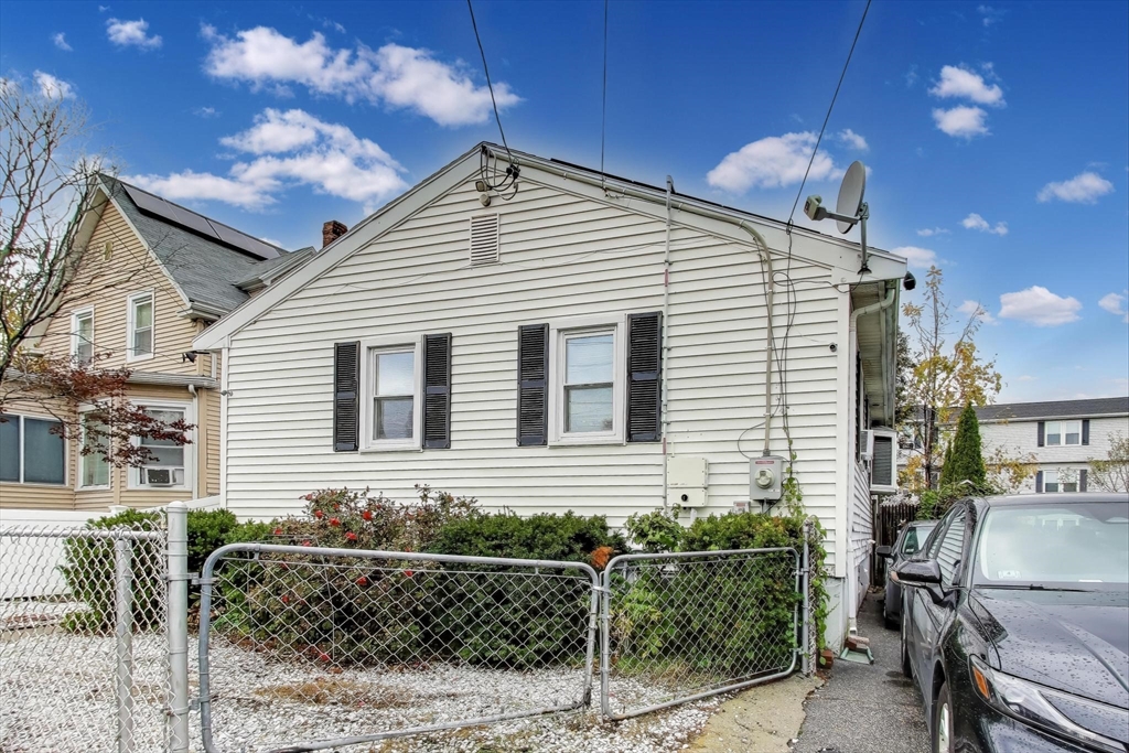 3 River St Court Lynn, MA 01905 - Photo 3 of 24 a front view of a house