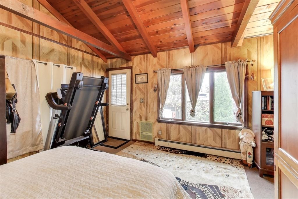 3 River St Court Lynn, MA 01905 - Photo 10 of 24 a bedroom with a bed next to a window