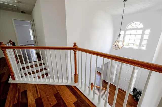 a view of entryway with wooden floor