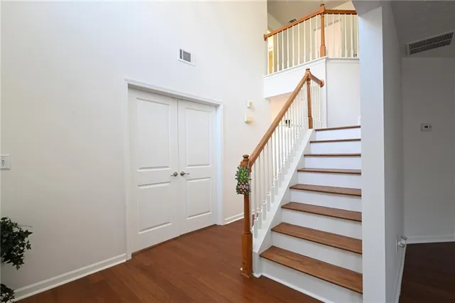 a view of entryway with wooden floor