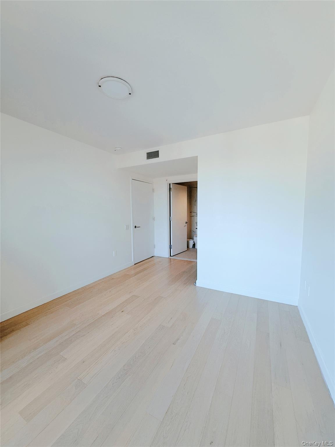 138-35 39th Avenue, Unit 16K Queens, NY 11354 - Photo 19 of 21 a view of an empty room