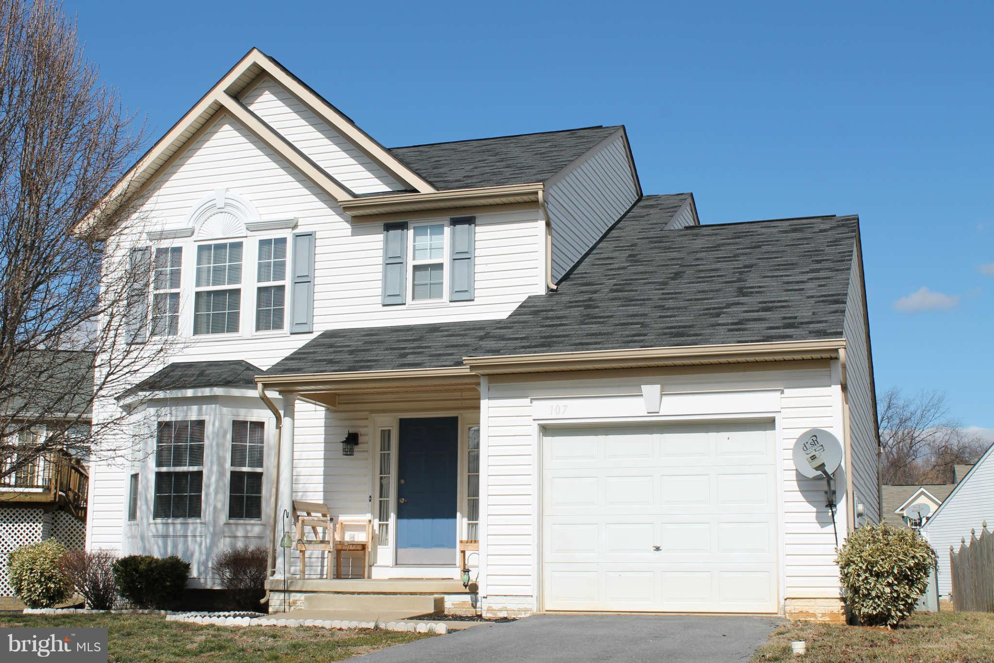 107 Estate Lane Ranson, WV 25438 - Photo 2 of 30 a front view of a house with a yard