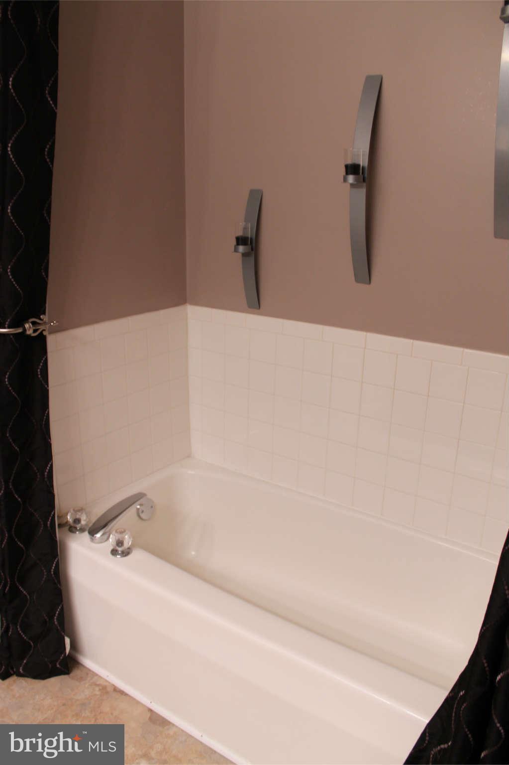 107 Estate Lane Ranson, WV 25438 - Photo 20 of 30 a bathroom with a bathtub